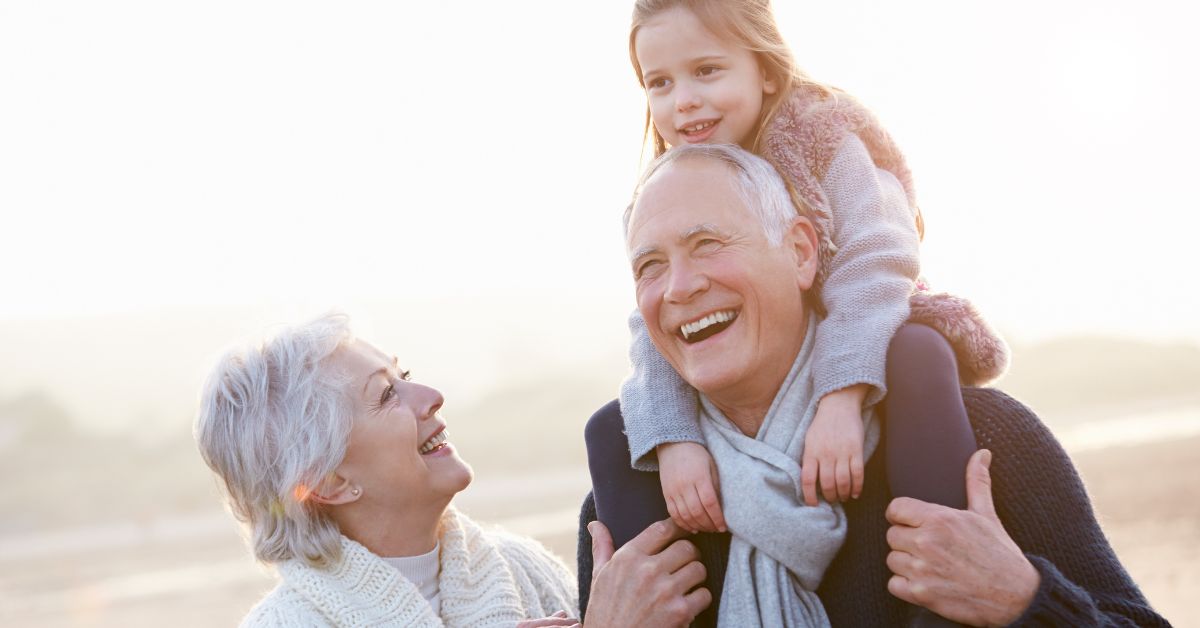 An older couple and a little girl are enjoying themselves in one of the best suburbs to retire in Dallas TX,