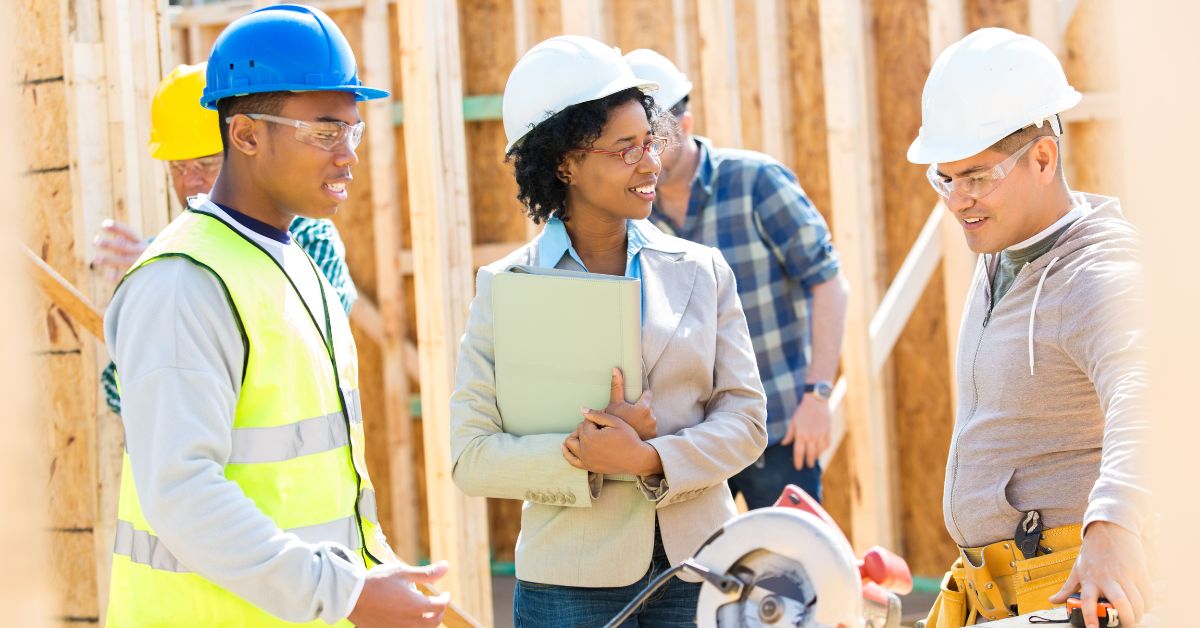 A group of construction workers building in Dallas, TX.